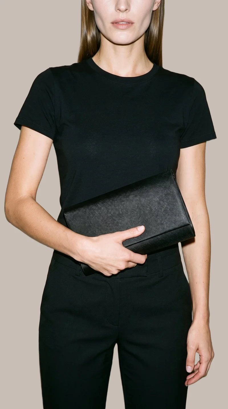 Black Satin Clutch, Torso at Front, Studio Cutout lighting