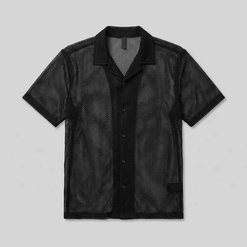 A mostly complete black short-sleeve mesh button-up shirt is shown laid flat in a standalone front view. It has an open camp collar, V-shaped front opening, narrow button placket, straight hem, set-in sleeves, visible perforations throughout, reinforced edging, and a lower front patch pocket.