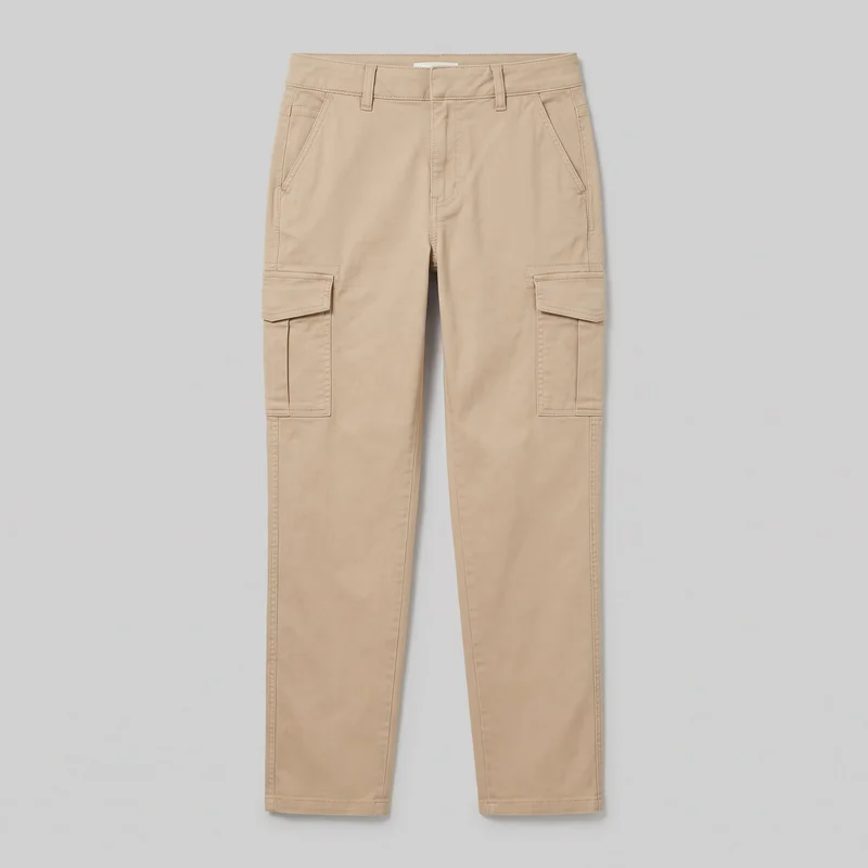 Women's beige cargo pants shown in a mostly complete front flat-lay view. The mid-rise, full-length pants have a structured waistband with belt loops, a centered fly, angled front hand pockets, small horizontal pocket details near the upper side seams, and rectangular thigh cargo pockets with flap closures. Straight-to-slightly tapered legs, plain stitched hems, and visible double-row construction stitching are shown.
