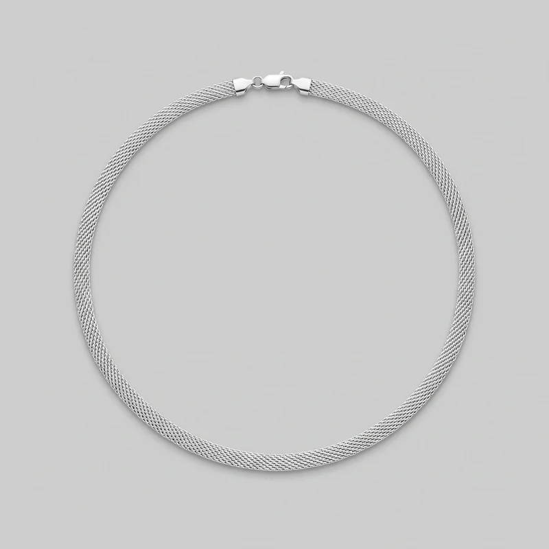 A silver choker is shown laid out as a complete oval loop. Its flexible, densely braided mesh chain has a smooth, rounded surface and consistent width, ending in tapered caps with a lobster-style clasp and connector ring visible at the top; no pendant or additional embellishments are shown.