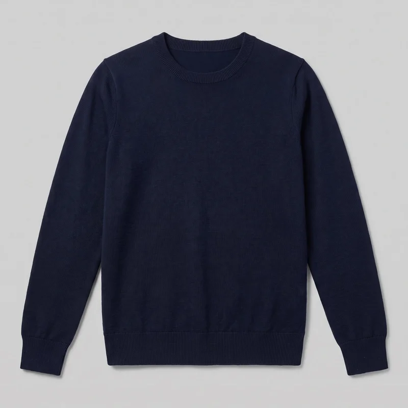 A mostly complete standalone flat view of a women's navy merino knit crewneck pullover sweater. The front shows a regular straight silhouette, full-length body, set-in shoulders, long tapered sleeves with ribbed cuffs, a rounded ribbed neckband, visible shoulder and side seams, and a straight ribbed hem. No closures, pockets, logos, prints, patches, embroidery, or embellishments are visible.