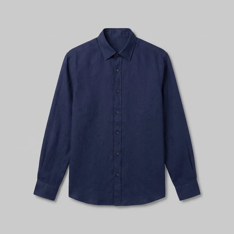 Navy linen collared shirt shown alone in a complete front view. It has long sleeves with structured cuffs, a full front button placket, a pointed fold-down collar, a regular straight silhouette, and a curved shirttail hem. The woven fabric has a subtly slubbed surface, with no visible chest pockets, logos, prints, patches, embroidery, or embellishments.