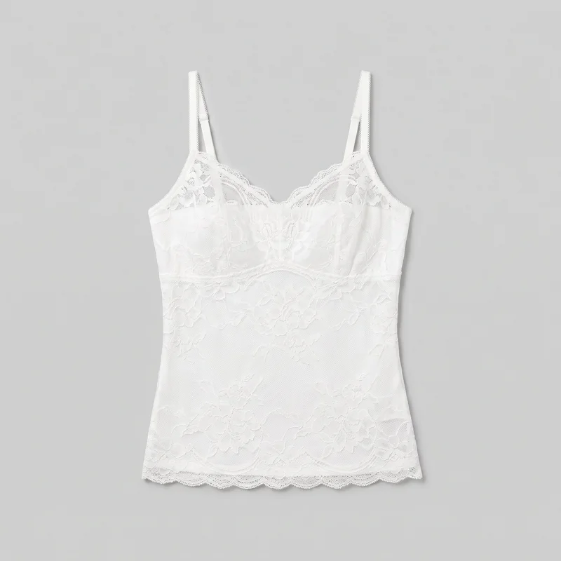 A complete front-facing view of a white floral lace camisole with a slim, body-skimming silhouette. It has narrow shoulder straps, shaped bust cups, a V-shaped scalloped neckline, an underbust seam, floral lace over a mesh-like ground, and a scalloped lace lower hem.