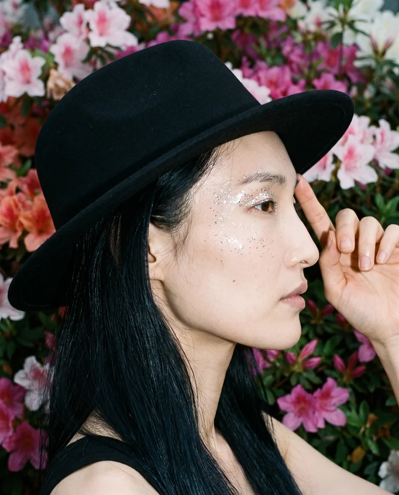 Women's Black Wool Fedora, Head at Side, Natural E-Commerce lighting