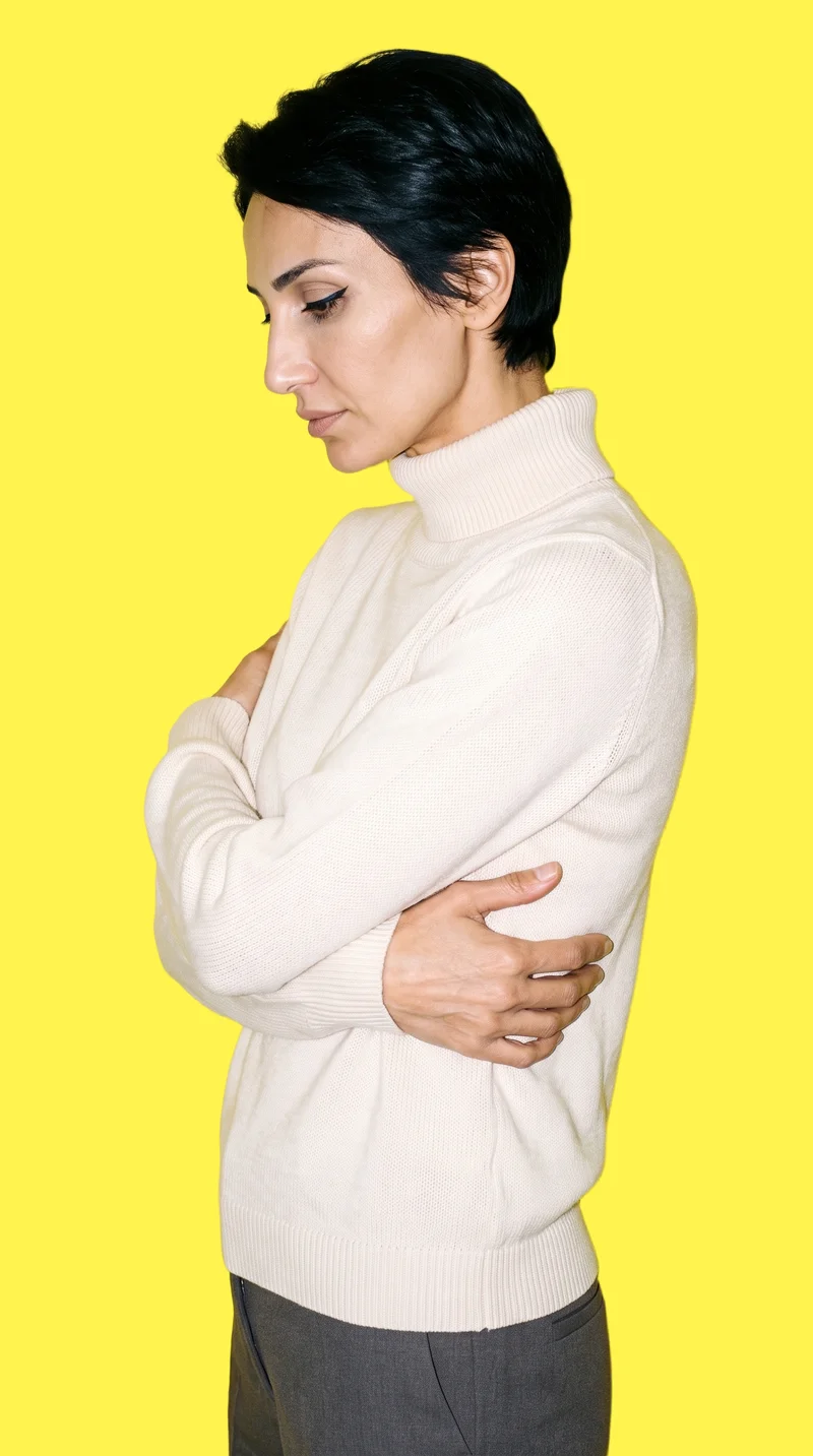 Women's Cream Knit Turtleneck, Upper body at Side, Studio Cutout lighting