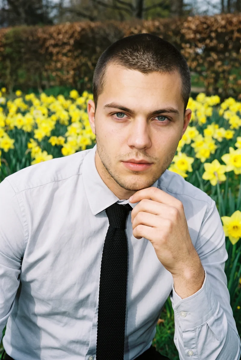 Black Knitted Tie, Upper body at Front, Natural E-Commerce lighting