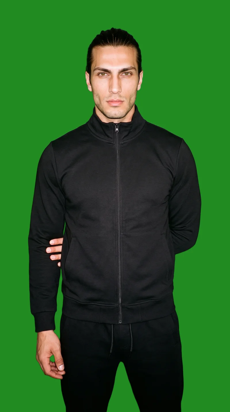 Men's Black Tracksuit, Three-quarter length at Front, Studio Cutout lighting