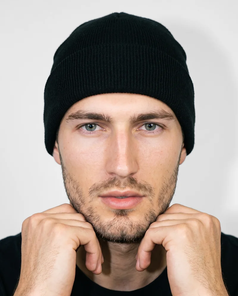 Men's Black Knit Beanie, Head at Front, Natural E-Commerce lighting