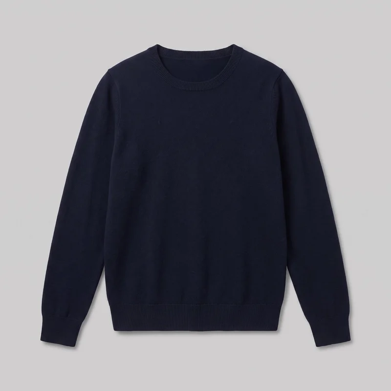 A complete standalone front view of a women's navy wool pullover jumper is shown flat. The sweater has a rounded crew neckline, a straight standard-length body, set-in long sleeves, visible shoulder and armhole seams, and ribbed trim at the neckband, cuffs, and straight hem.