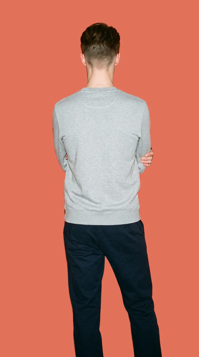 Men's Grey Crewneck Sweatshirt, Three-quarter length at Back, Studio Cutout lighting