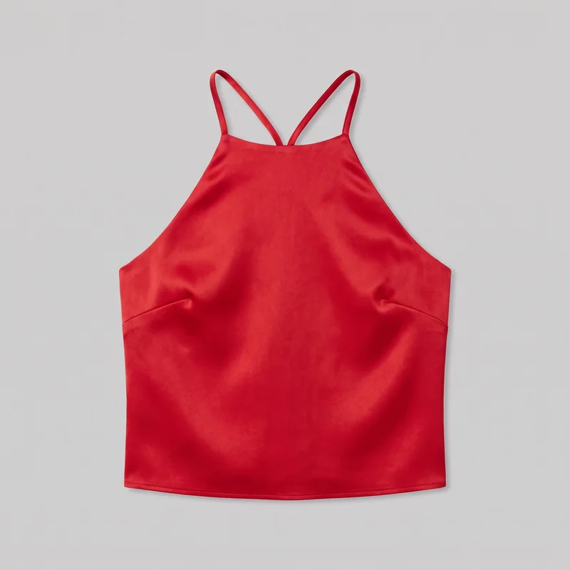 A red satin sleeveless halter camisole top is shown as a mostly complete standalone product view. It has a straight high neckline, narrow looped halter straps, deeply curved armholes, subtle diagonal bust and under-bust shaping seams, and a straight full hem.