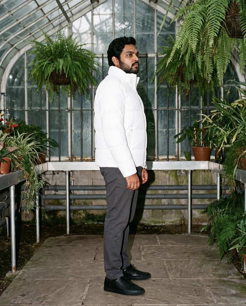 Men's White Padded Ski Jacket, Full body at Side, Flash Editorial lighting