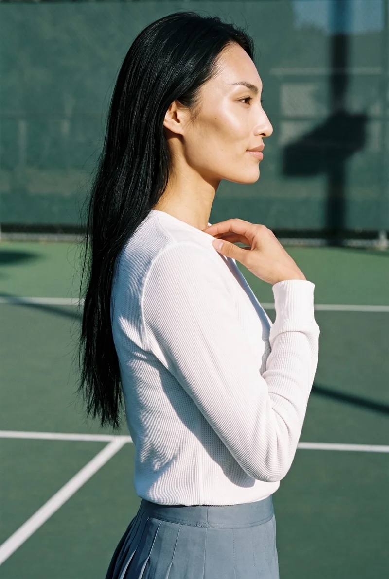 Women's White Base-Layer Thermal Top, Upper body at Side, Flash Editorial lighting
