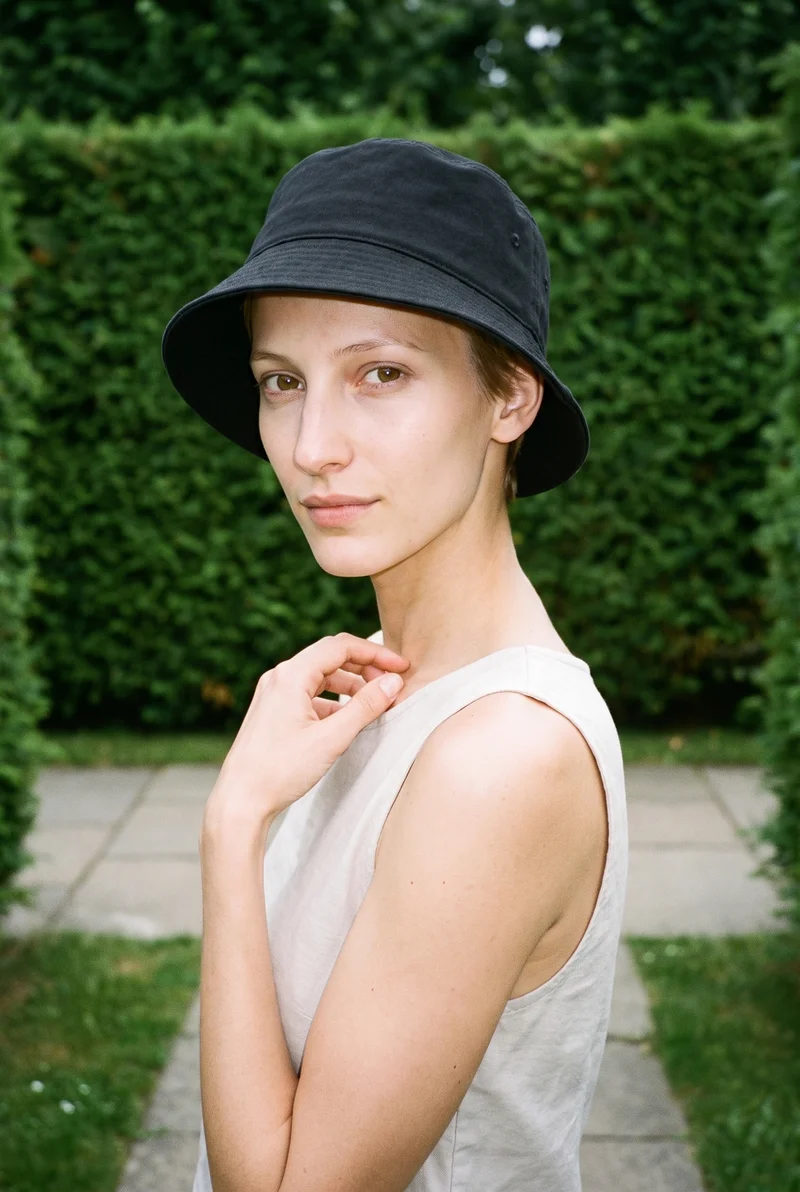 Women's Black Bucket Hat, Bust at Three-quarter, Natural E-Commerce lighting