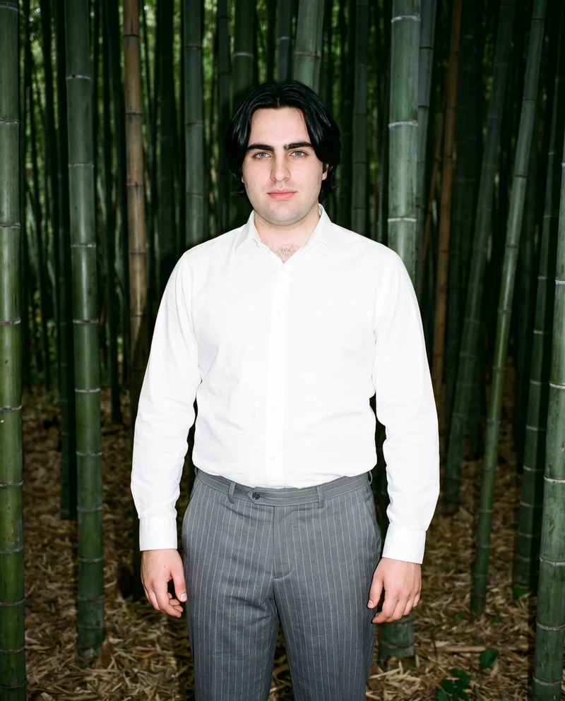 Men's Grey Pinstripe Tailored Trousers, Three-quarter length at Front, Natural E-Commerce lighting